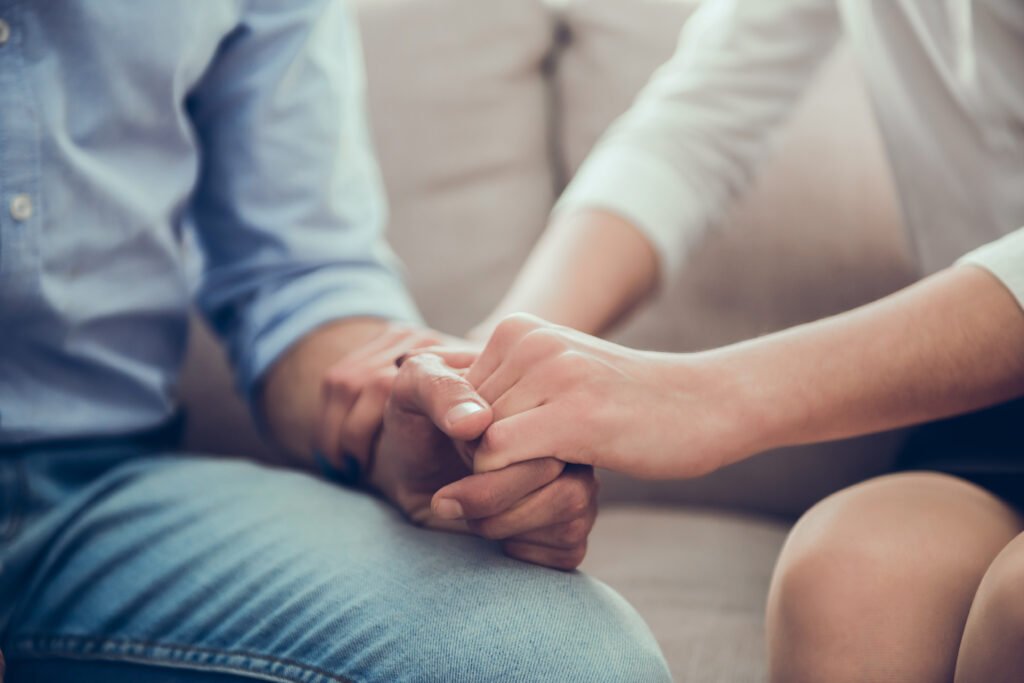 Supportive hand holding for care and contact sections